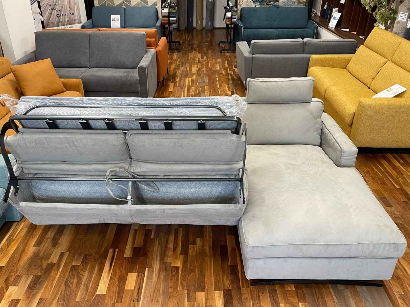 DEDALO - rohová sedací souprava s rozkládací postelí